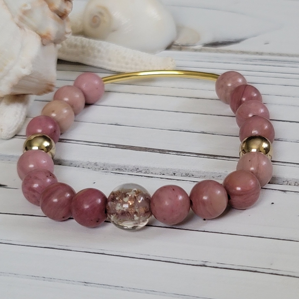 Pink Rhodonite and gold bracelet.